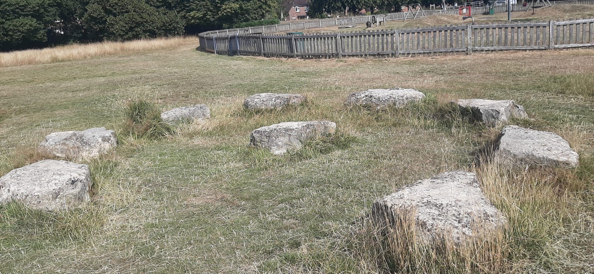 Rocks in a circle symbolising teamwork needed for group and team supervision